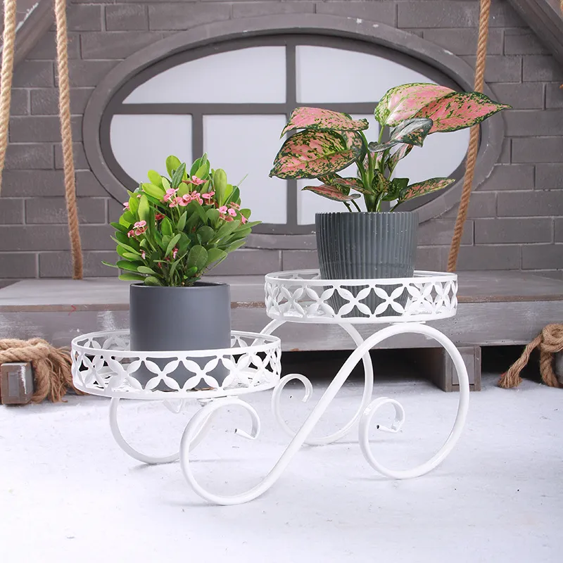 Picture of European-style iron flower pot rack High and low floor green pineapple meat pot rack Living room balcony floor type plant rack